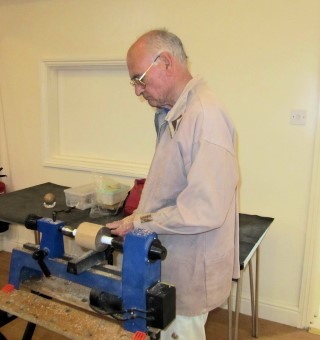 Geof Horsfield was turning a sphere using his sphere turning tool